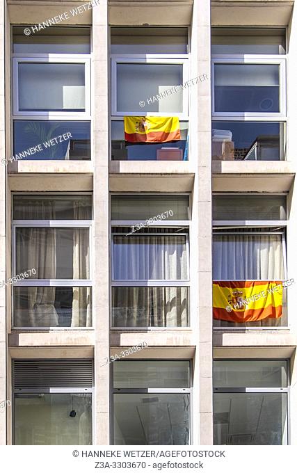 Spanish flags hanging from balconies in Las Palmas de Gran Canaria, Canary Islands