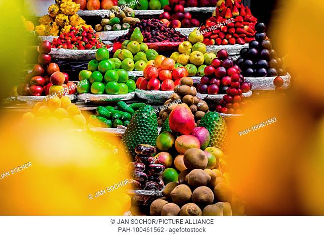 Piles of fruits (apples, pears, mangos, strawberries, guanabanas, sapotes etc.) are seen arranged at the fruit market of Paloquemao in Bogota, Colombia