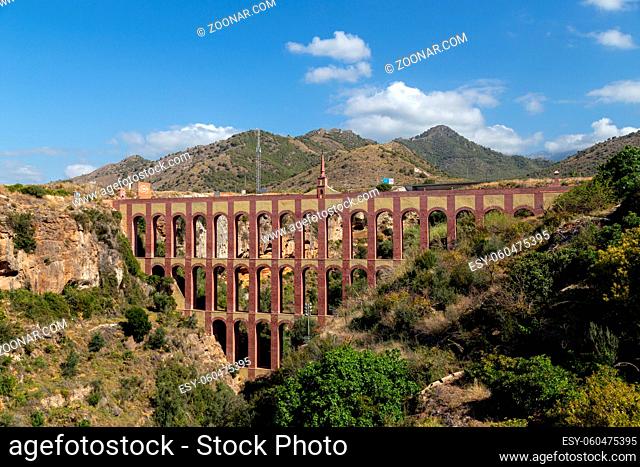 Nerja, Spain - May 30, 2019: View of the historical Eagle Aqueduct close to Nerja