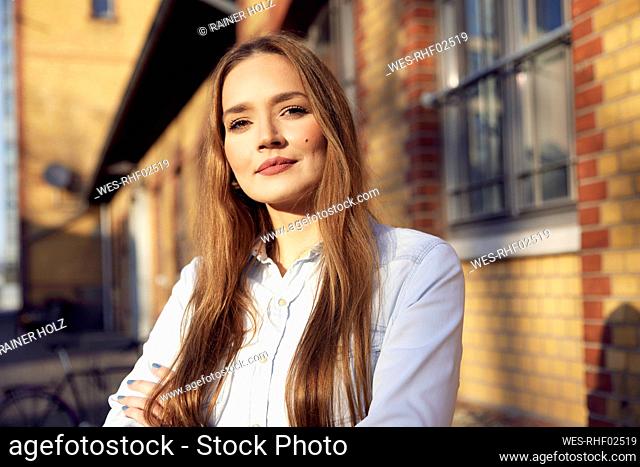 Young entrepreneur staring while standing outdoors