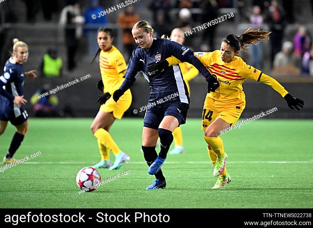 Rosengard's Ria Oling and Barcelona's Aitana Bonmatí battle for the ball during the UEFA Women's Champions League group A soccer match between FC Rosengard and...