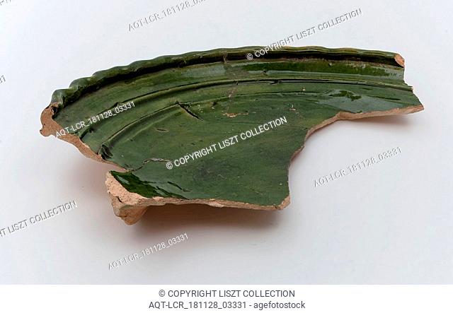 Fragment of dish on stand lobes, green, rippled edge, dish kitchenware holder soil find ceramic earthenware glaze tin glaze copper oxide