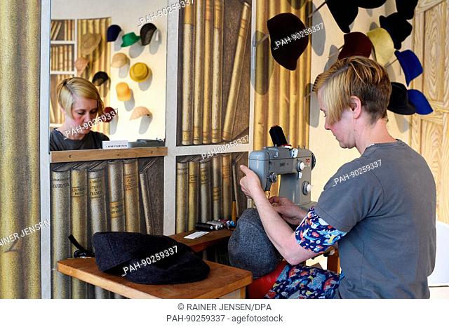 Hat designer Rike Feurstein working in her shop in Berlin, Germany, 11 April 2017. The hat designer keeps red-haired sheep in Grosswuestenfelde near Teterow