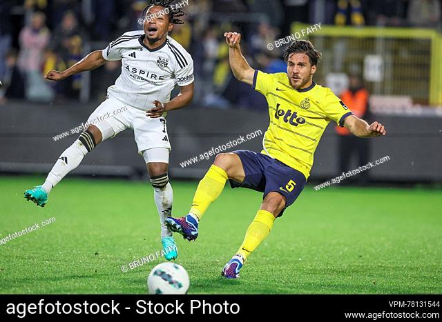Eupen's Isaac Nuhu and Union's Kevin Mac Allister fight for the ball during a soccer match between Royale Union Saint-Gilloise and KAS Eupen