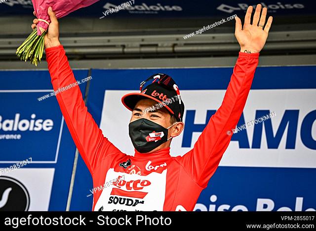 Australian Caleb Ewan of Lotto Soudal celebrates on the podium in the red jersey for leader in the overall ranking the fourth stage of the Baloise Belgium Tour...