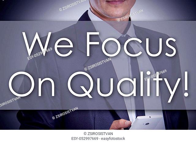 We Focus On Quality! - Young businessman with text - business concept - horizontal image