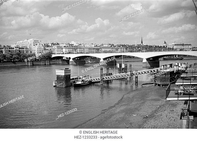 Festival Pier, Lambeth, London, c1945-1965. A view looking northwards towards Waterloo Bridge with the pier in the foreground