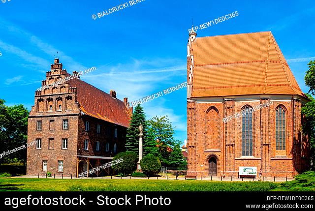 Poznan, Poland - June 6, 2015: Psalmodists House and Holiest Virgin Mary Church on historic Ostrow Tumski island at Cybina river