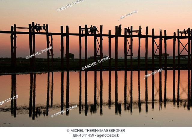 U Bein Bridge at sunset, Thaungthaman lake, Amarapura, Burma, Myanmar, South East Asia