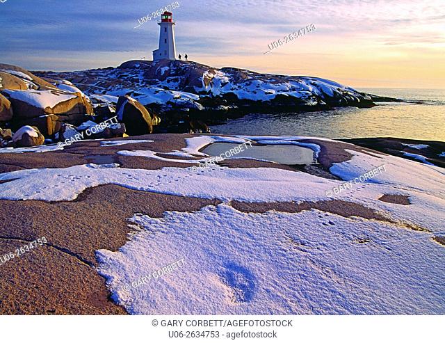 Peggy's Cove Lighthouse in winter with snow, Nova Scotia, Canada