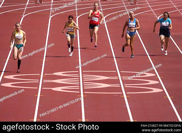 27 August 2021, Japan, Tokio: Paralympics: Athletics, 100m, women, 1st round, 2nd group, at Olympic Stadium. Isis Holt (l-r) of Australia