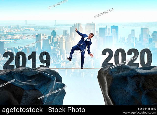Businessman on the tight rope from year 2019 to 2020