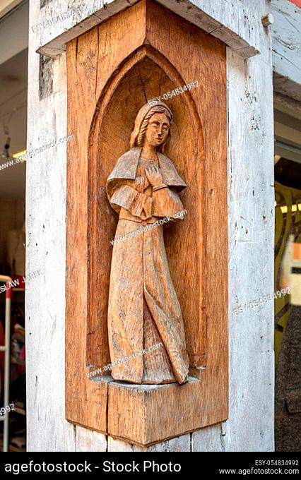 Religious sculpture on the wall of a house in medieval Troyes old town, Aube, Champagne-Ardenne, France