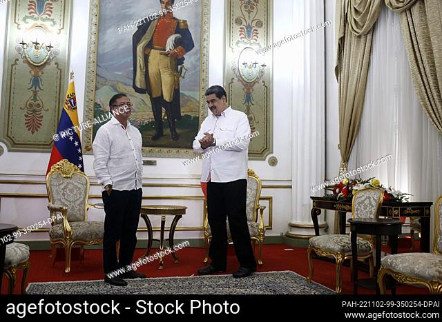 02 November 2022, Venezuela, Caracas: Venezuelan President Nicolás Maduro (r) and Colombian President Gustavo Petro meet at Miraflores Palace in Caracas for...
