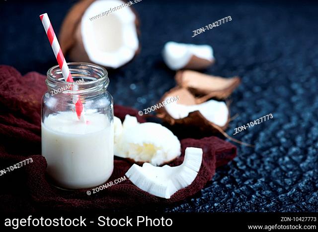 coconut products on a table, coconut milk and butter