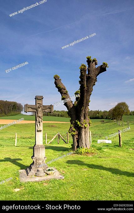 Wayside cross near Terborgh castle in the Dutch village Schinnen in the most southern province Limburg