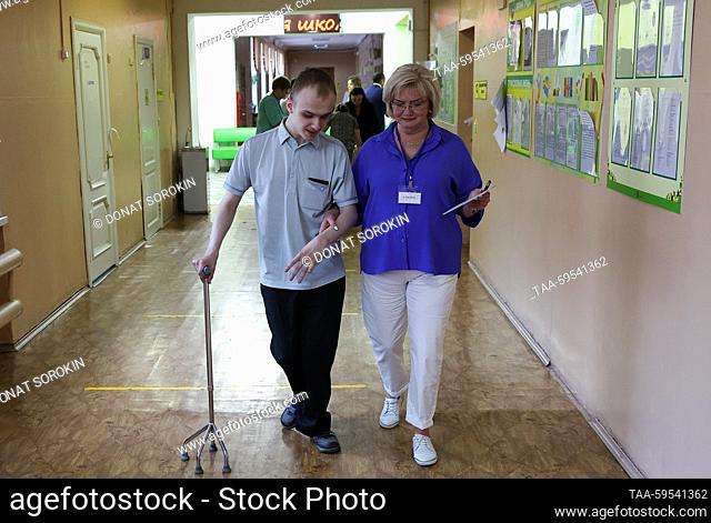 RUSSIA, SVERDLOVSK REGION - JUNE 1, 2023: A visually impaired student of the Verkhnyaya Pyshma boarding school named after Martirosyan with an assistant is seen...