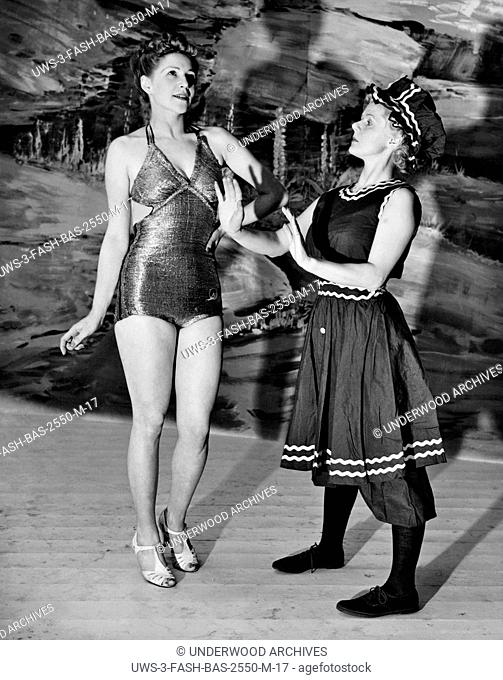 London, England: 1938 Bathing costumes of yesterday and today are seen at the Women's Fair which opened in Olympia today