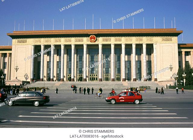 The Great Hall of the People in Tiananmen square, with cars and people in front. The Great Hall of the People was built in September 1959 by volunteers to mark...