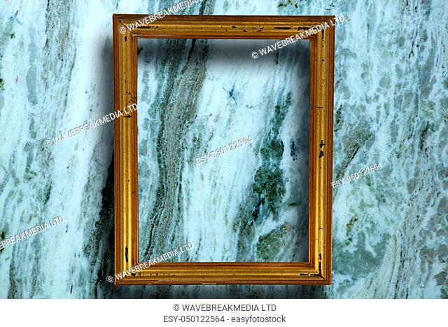 Empty photo frame against modern marble surface