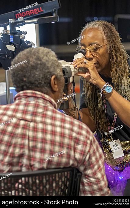 Detroit, Michigan - The OneSight Foundation organized a free clinic that offered eye exams and prescription glasses for low-income residents