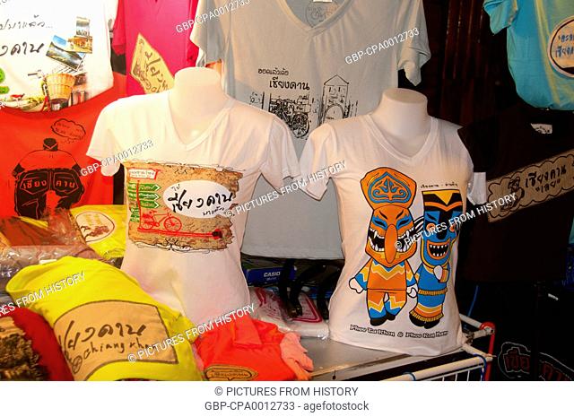 Thailand: Locally made T-shirts including one with Phi Ta Khon masks for sale on Chai Kong Road, Chiang Khan, Loei Province