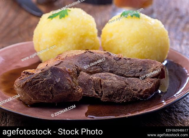 bavarian roasted pork with potato dumplings