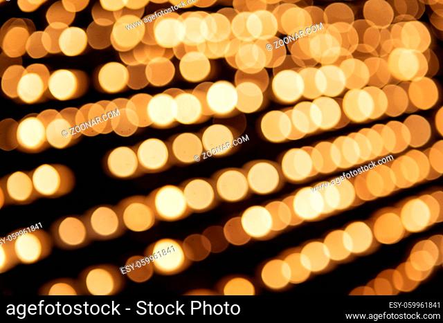 Bokeh lights. Beautiful Christmas background. Gold abstract bokeh background