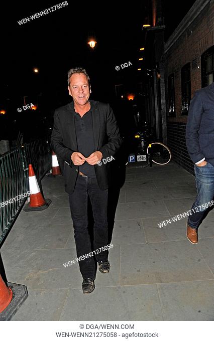 Kiefer Sutherland at the Chiltern Firehouse restaurant in Marylebone. He wore a pair of scruffy unpolished shoes that have seen better days as one was split on...