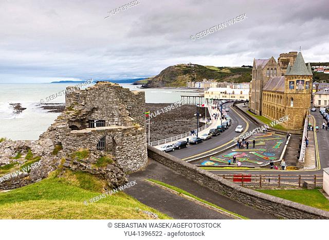 Ruins Aberystwyth Castle 1277 and University College 1865, Victorian style building, Aberystwyth, Ceredigion, West coast mid Wales  UK