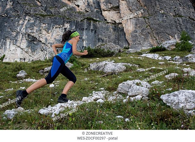 Italy, Dolomites, Veneto, trail runner near Federa Lake