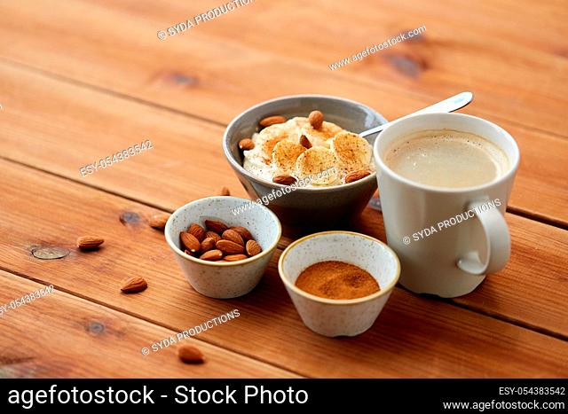 oatmeal with banana and almond on wooden table