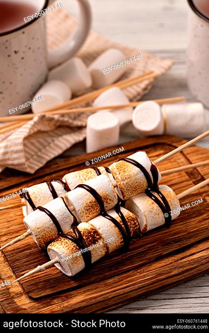marshmallow on old wooden table