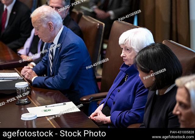 United States Secretary of the Treasury Janet Yellen, listens as US President Joe Biden speaks during a meeting in the Cabinet Room of the White House in...
