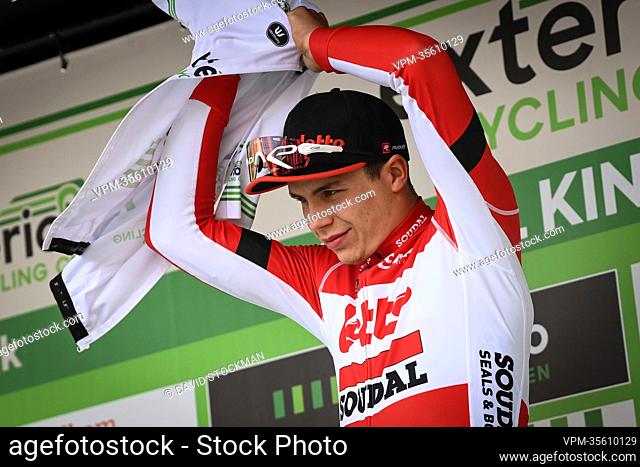 Belgian Arnaud De Lie of Lotto Soudal celebrates in the leader jersey after the one day cycling race 'Marcel Kint Classic' (199km)