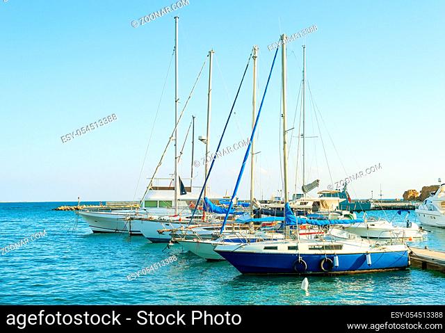 Yachts and motor boats in marina of Larnaca in sunny day, Cyprus