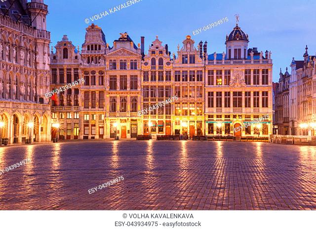 Beautiful houses of the Grand Place Square at night in Brussels, Belgium. From right to left Le Roy d'Espagne, La Brouette, Le Sac, La Louve, Le Cornet
