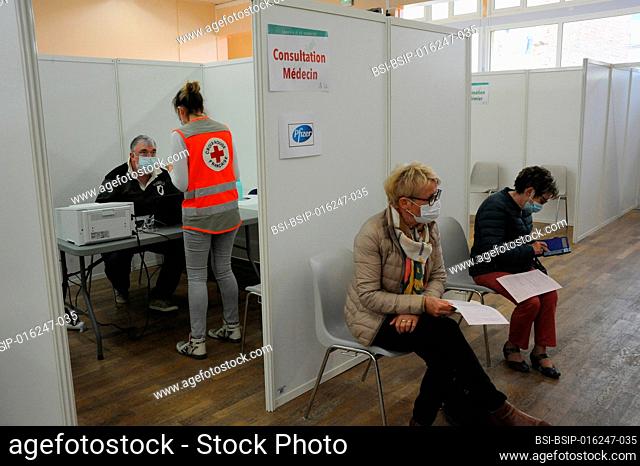 Monitoring of people after injection of a vaccine against Covid-19 in a vaccination center. French Red Cross volunteers in charge of monitoring people for a...