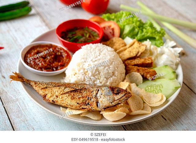 Fried mackerel fish rice with sambal, popular traditional Malay or Indonesian local food