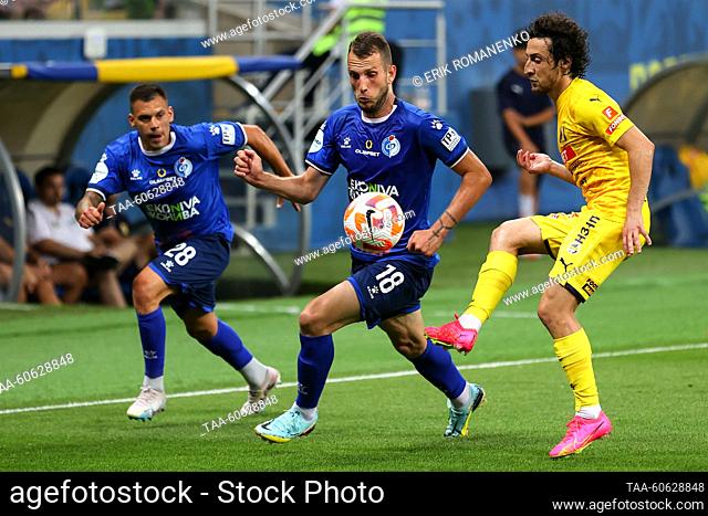 RUSSIA, ROSTOV-ON-DON - JULY 23, 2023: Fakel's Ruslan Magal, Andrei Mendel and Rostov's Khoren Bayramyan (L-R) struggle for the ball in a 2023/2024 Russian...