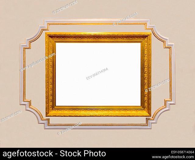 vintage gold carved wooden frame with blank white center surrounded by voluminous border