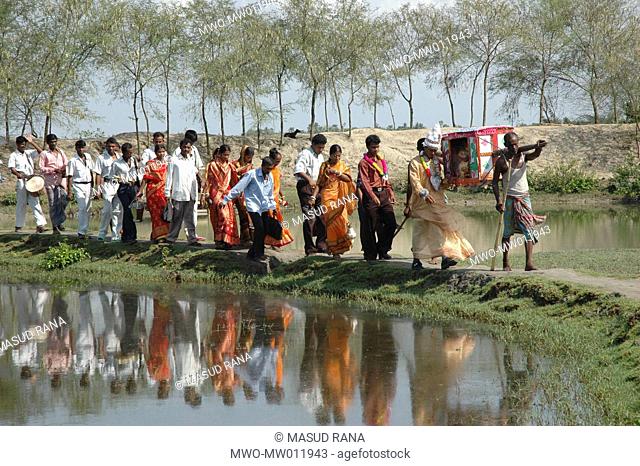 A marriage procession with the bride on a palanquin or Palki at Chalna, Khulna, Bangladesh October 11, 2005
