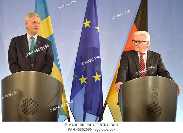 Germany's Minister for Foreign Affairs Frank-Walter Steinmeier and .Sweden's Minister for Foreign Affairs Carl Bildt (L) speak at a press conference at the...