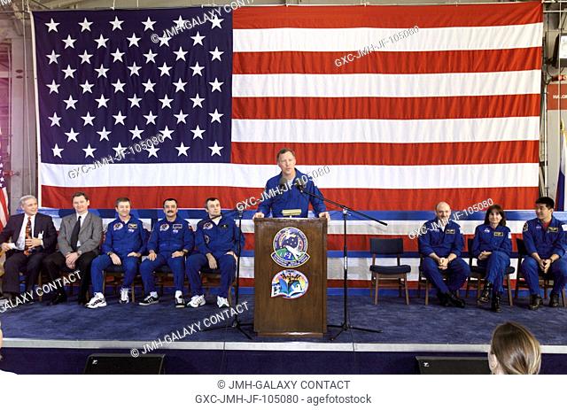Astronaut Dominic L. Gorie, STS-108 mission commander, speaks from the lectern in Hangar 990 at Ellington Field during the STS-108 and Expedition Three crew...