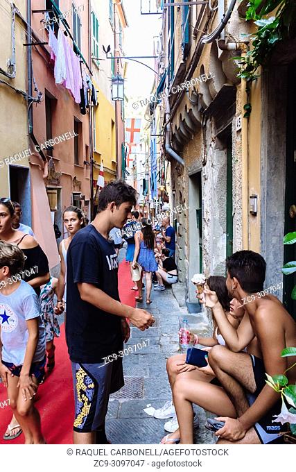 Narrow streets full of people in summer, Porto Venere, La Spezia, Liguria, Italy