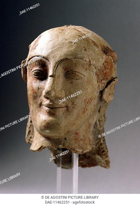 Head of Athena wearing a warrior's helmet, 500 BC-490 BC, terracotta statue, height 18.8 cm, from the Valley of the Temples, Agrigento, Sicily, Italy