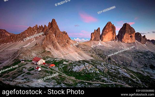 Amazing panorama of Italian Dolomites with famous Three Peaks of Lavaredo (Tre Cime di Lavaredo) South Tyrol, Italy, Europe at summer twilight