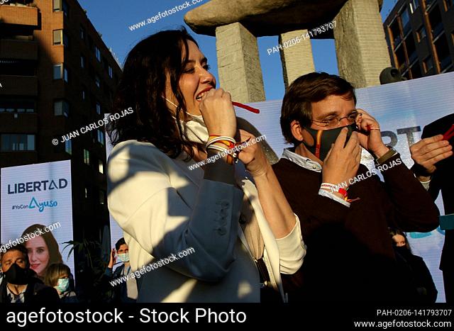 Madrid, Spain; 17.04.2021.- Ayuso tastes the birthday cake of the mayor of Madrid..Isabel Díaz Ayuso's Popular Party (PP) starts as the favorite to win the May...