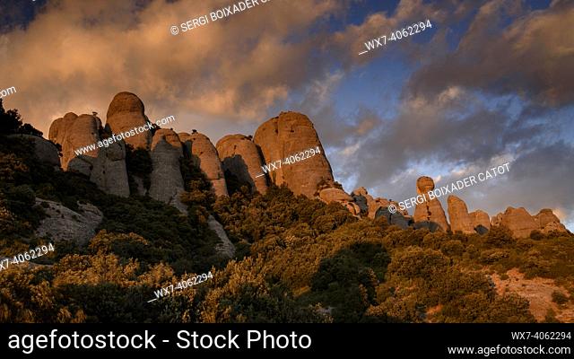 Montserrat mountain west face at sunset, seen from la Portella (Barcelona province, Catalonia, Spain)