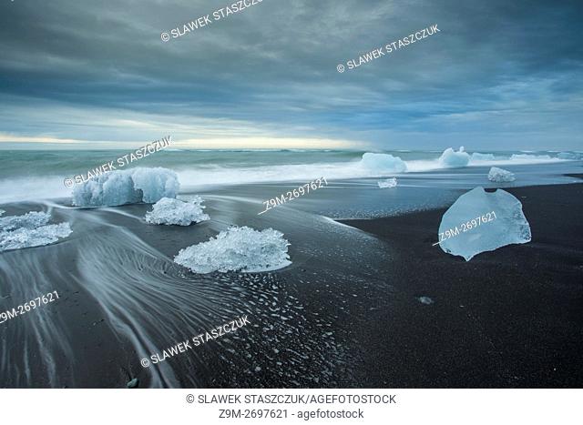 Ice blocks on the black beach at Jokulsarlon, Iceland